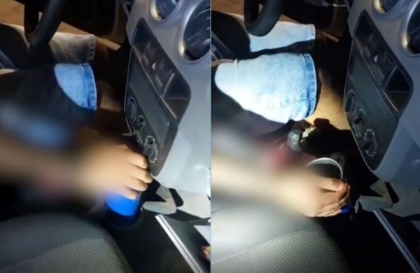 Motorista embriagado confunde câmbio com copo de bebida durante abordagem